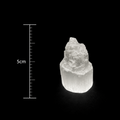 Crystal rock with a measurement scale on a black background