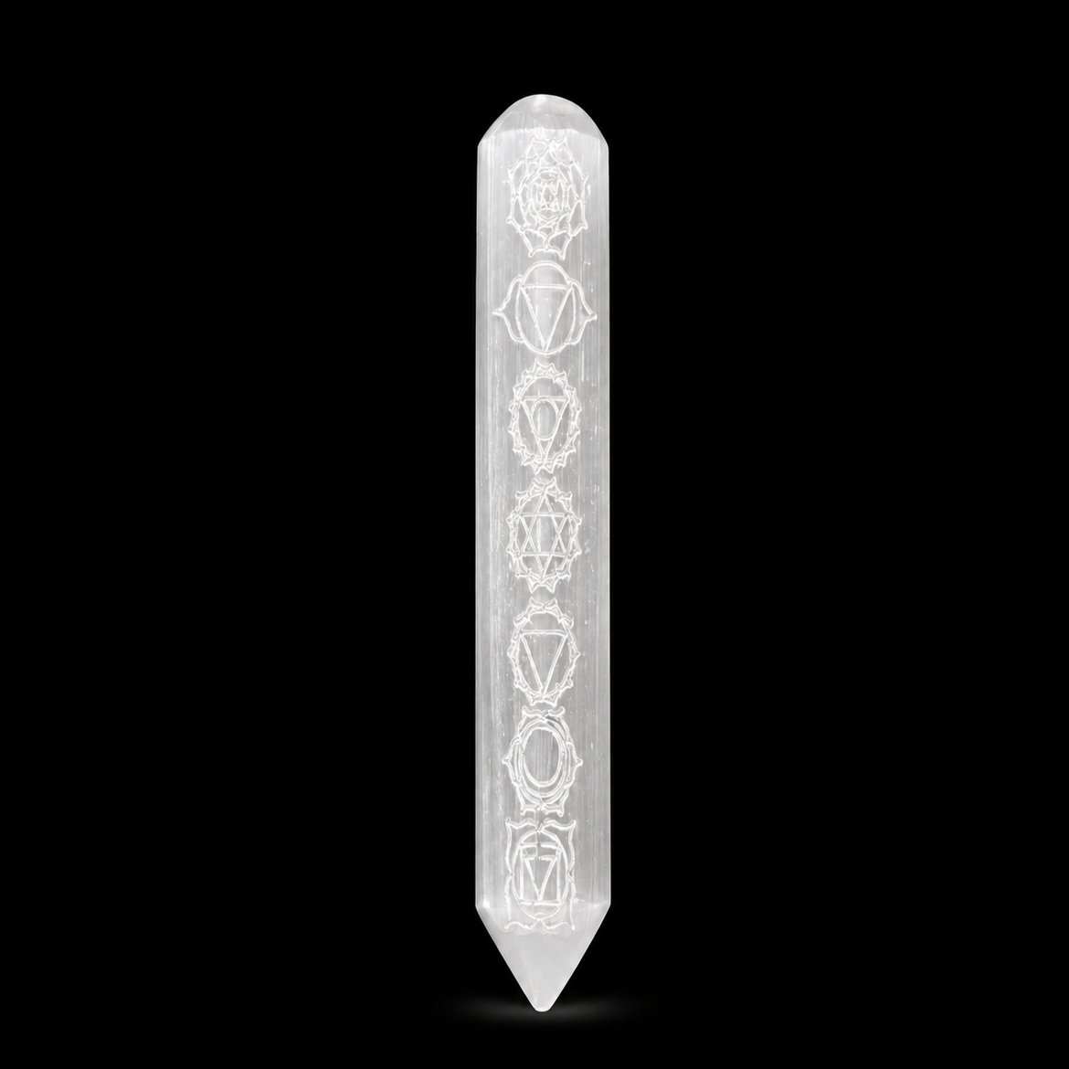 Crystal wand with engravings on a black background