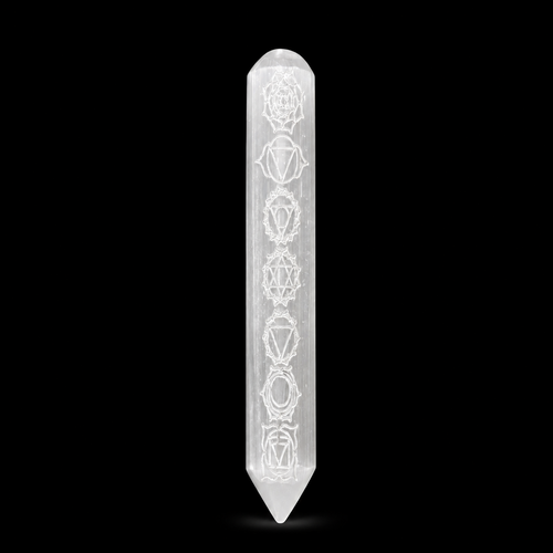 Crystal wand with engravings on a black background