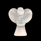 10cm carved selenite angel figurine made from natural Moroccan selenite on black background