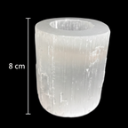 8cm natural selenite candle holder with polished top displayed with vertical measurement scale on black background