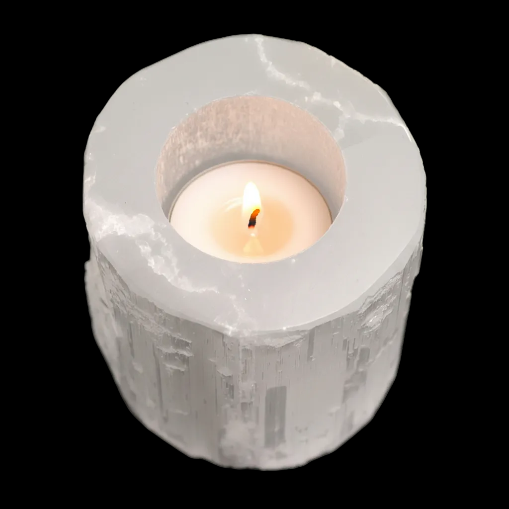 Lit tealight inside natural selenite candle holder with polished top and fibrous Moroccan stone texture