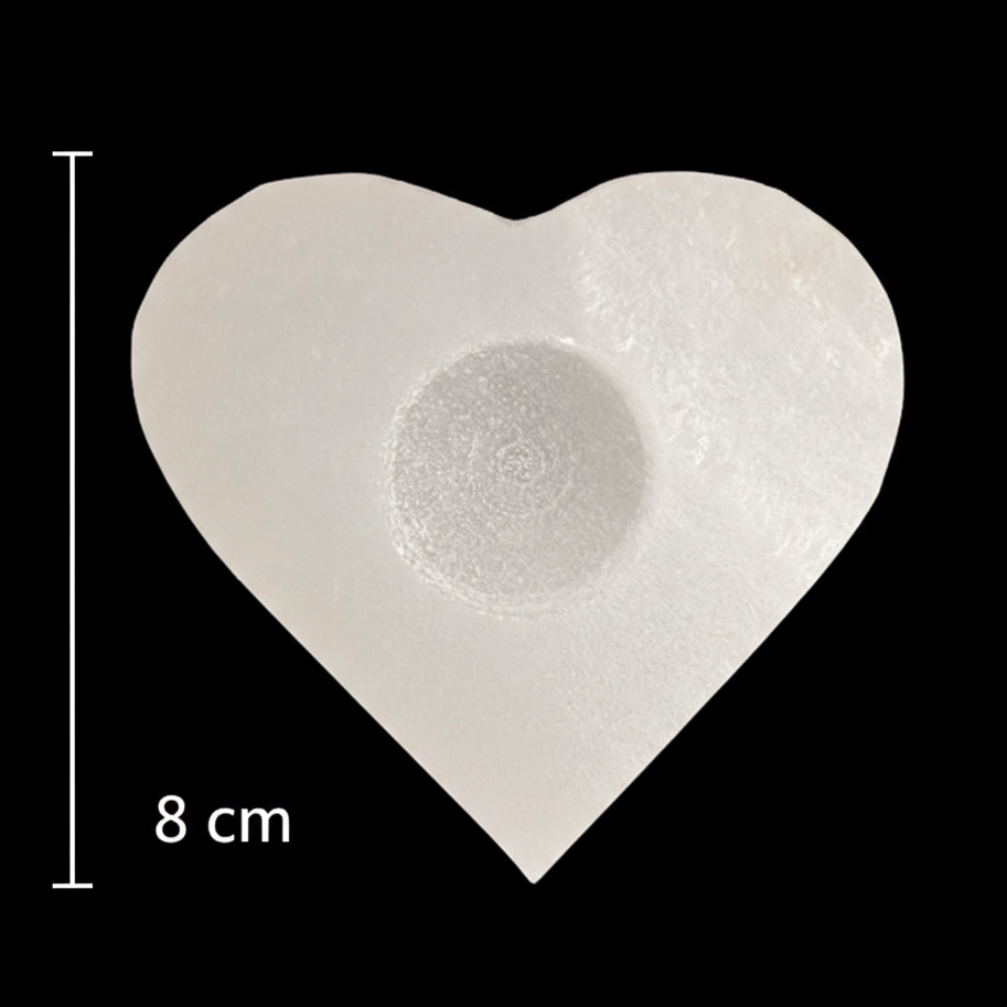 8cm heart shaped selenite candle holder with polished top displayed with vertical measurement scale on black background