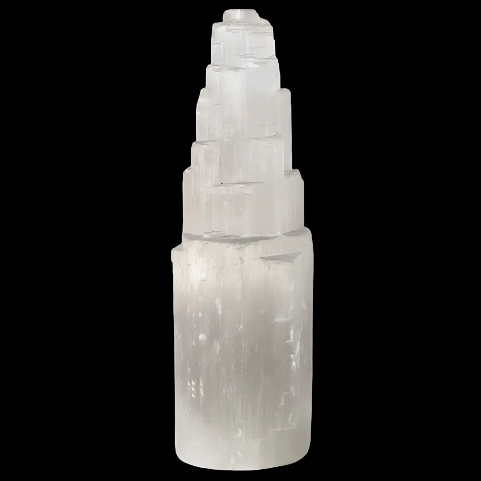 Natural selenite mountain lamp on black background
