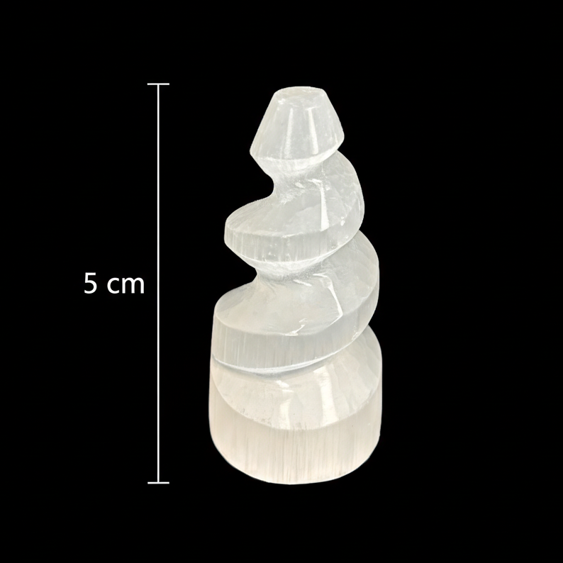 5cm polished mini selenite spiral tower crystal on black background with measurement scale